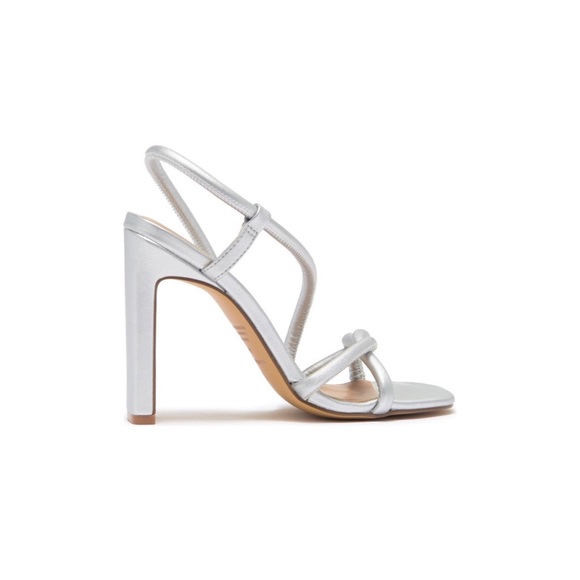 A sinuous strap twists across slingback sandal with a slender squared heel. - Picture 2 of 6